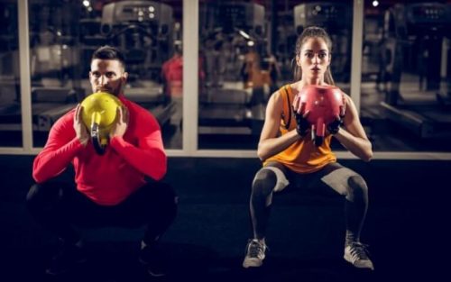 Par træner med vægte